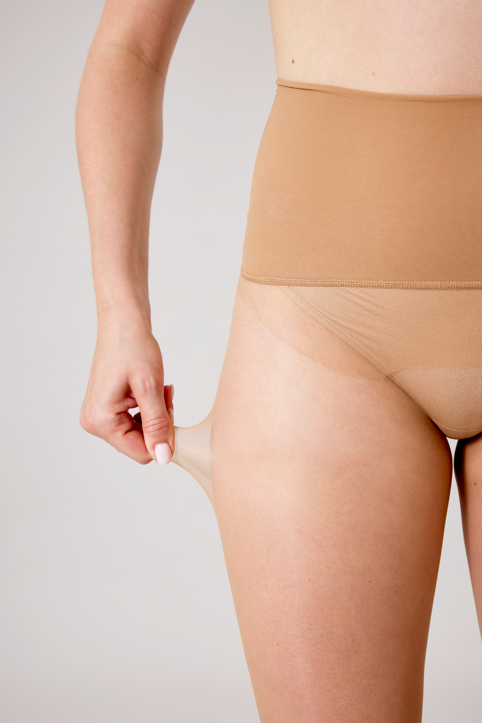 Gossamer-light 8-denier sheer tights with reinforced panty.