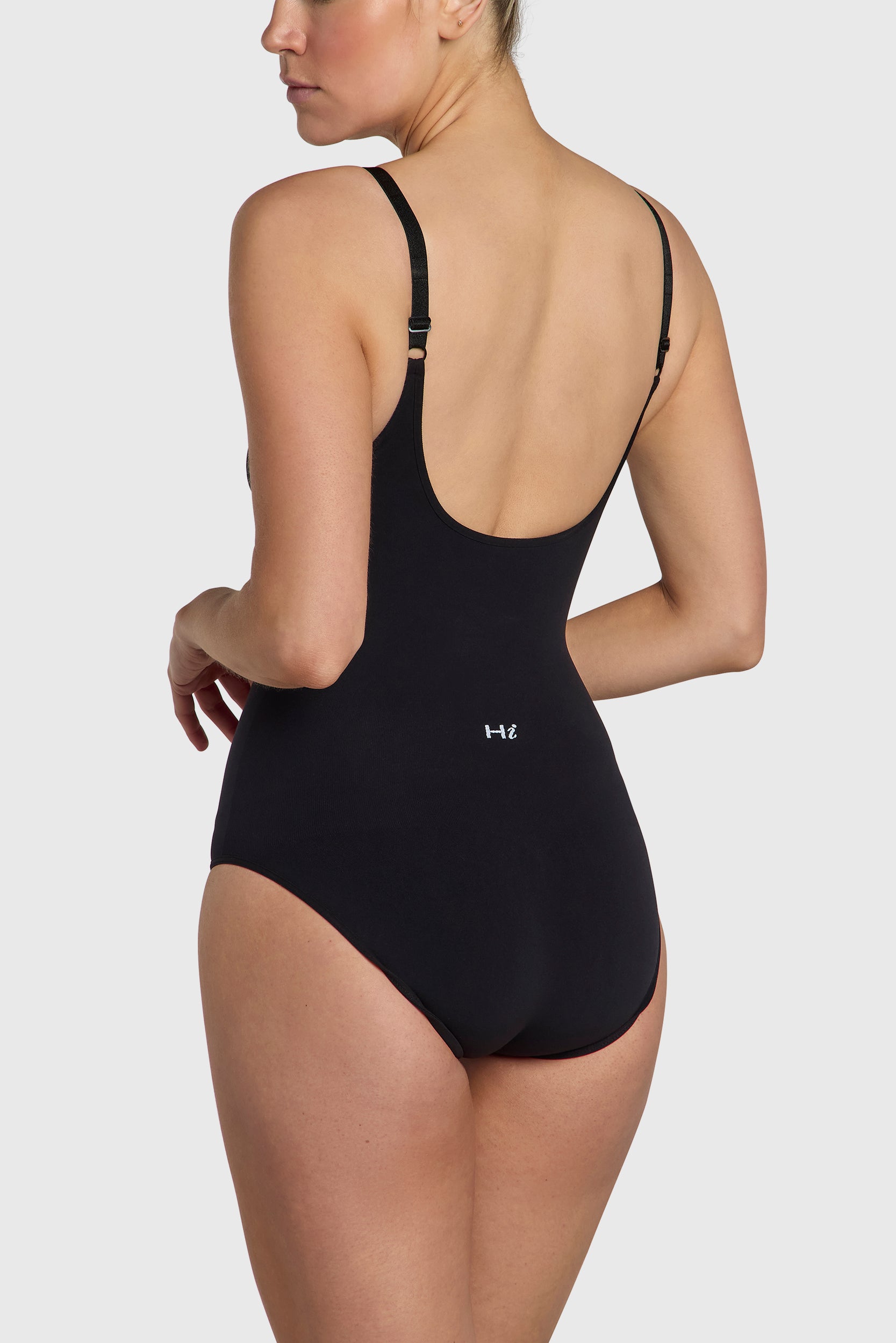 Black seamless body, strong compression and bust support.