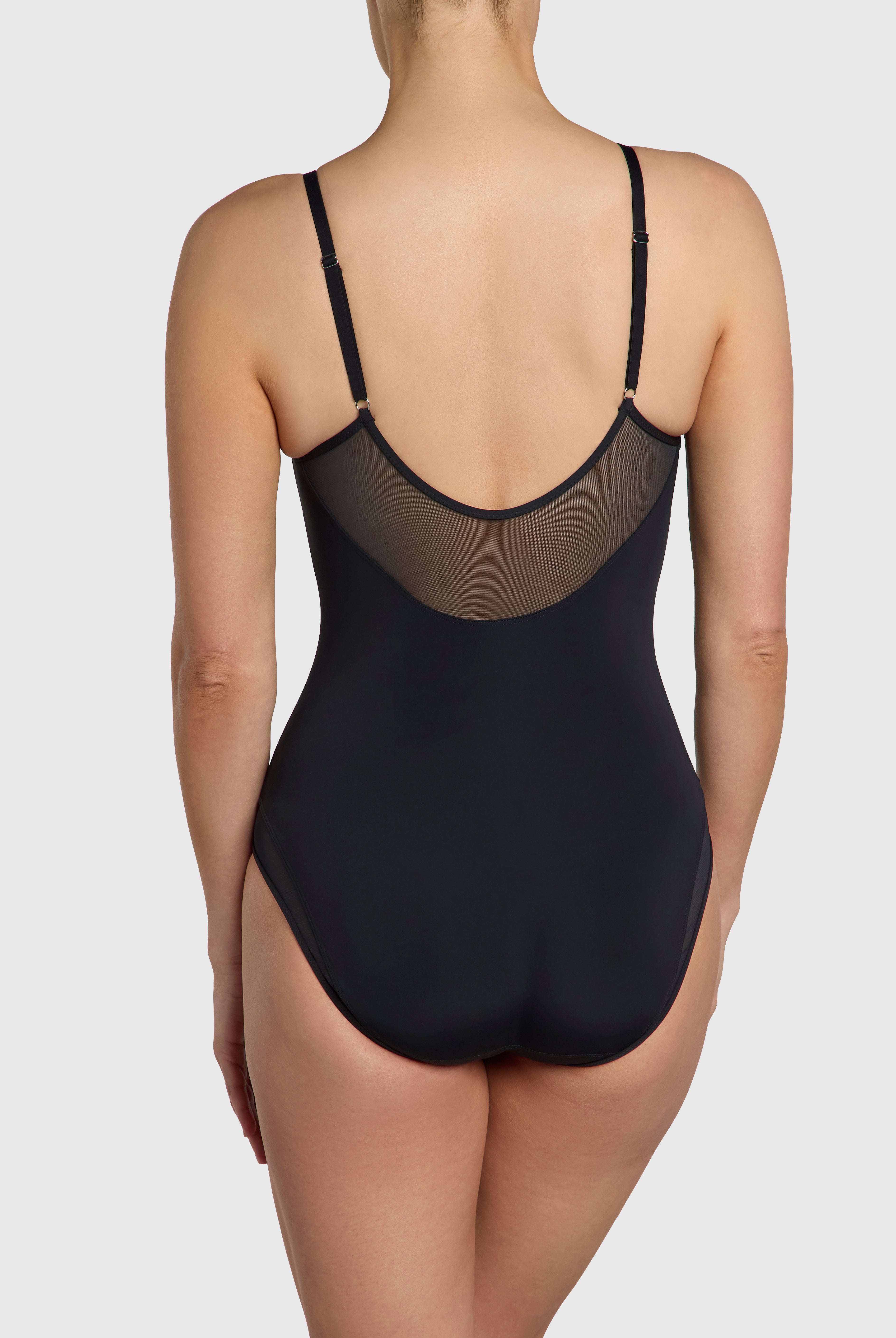 Silky sleek bodysuit with mesh paneling