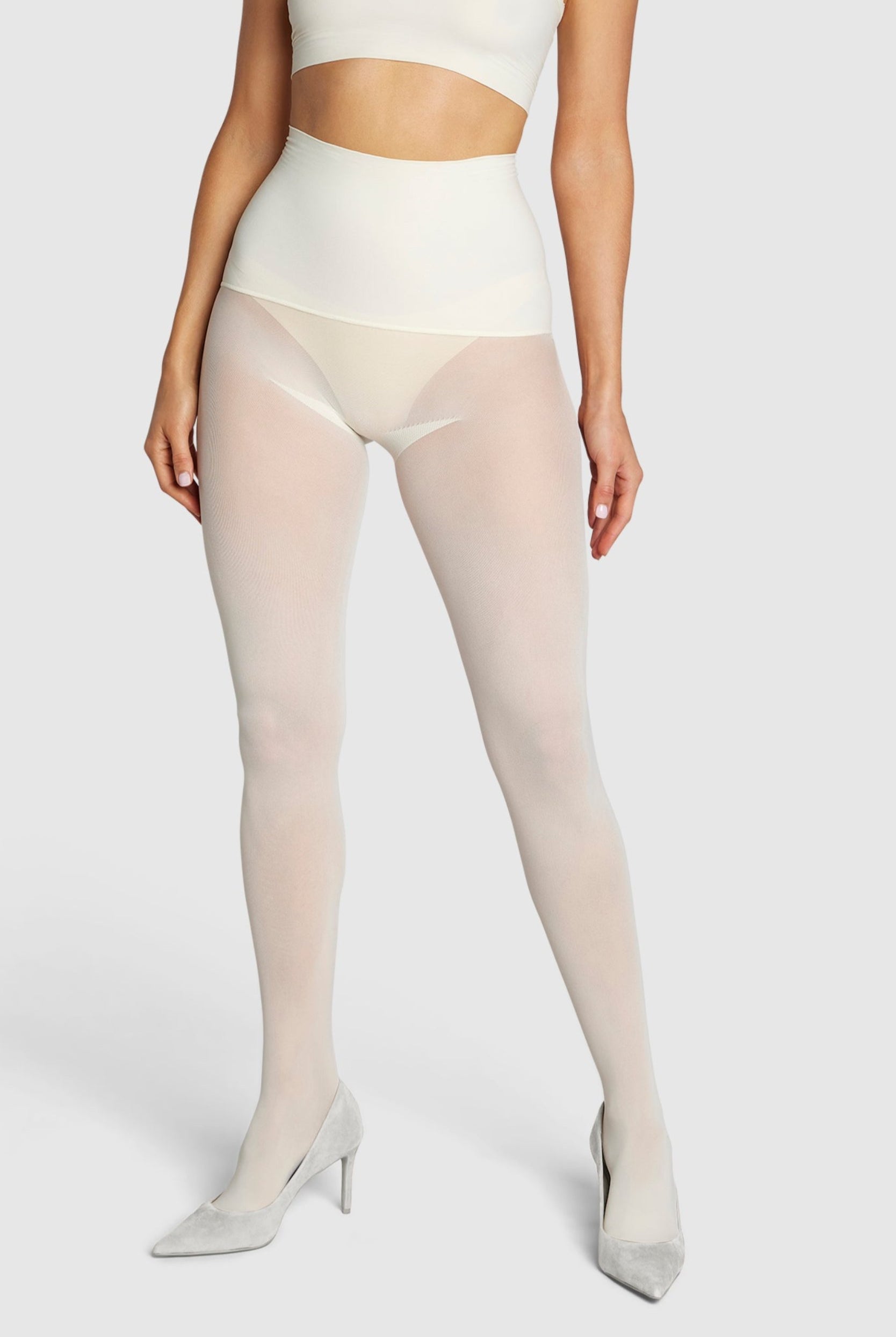 Opaque, eco-friendly 60 denier tights in vintage ivory white.
