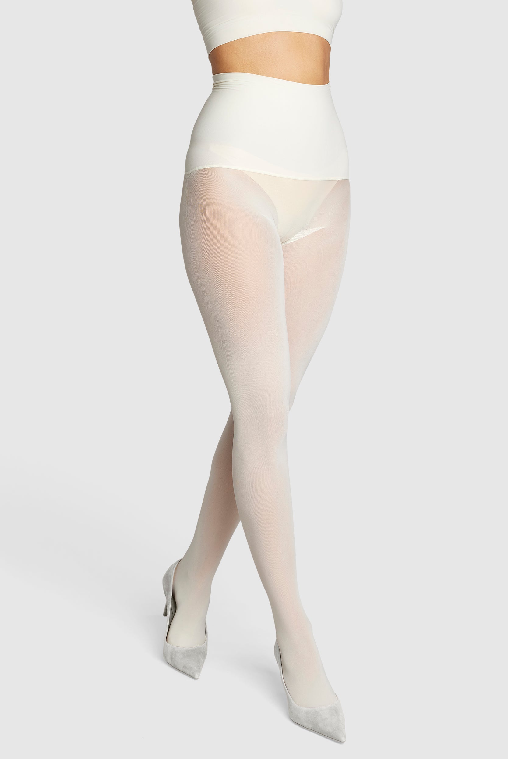 Opaque, eco-friendly 60 denier tights in vintage ivory white.