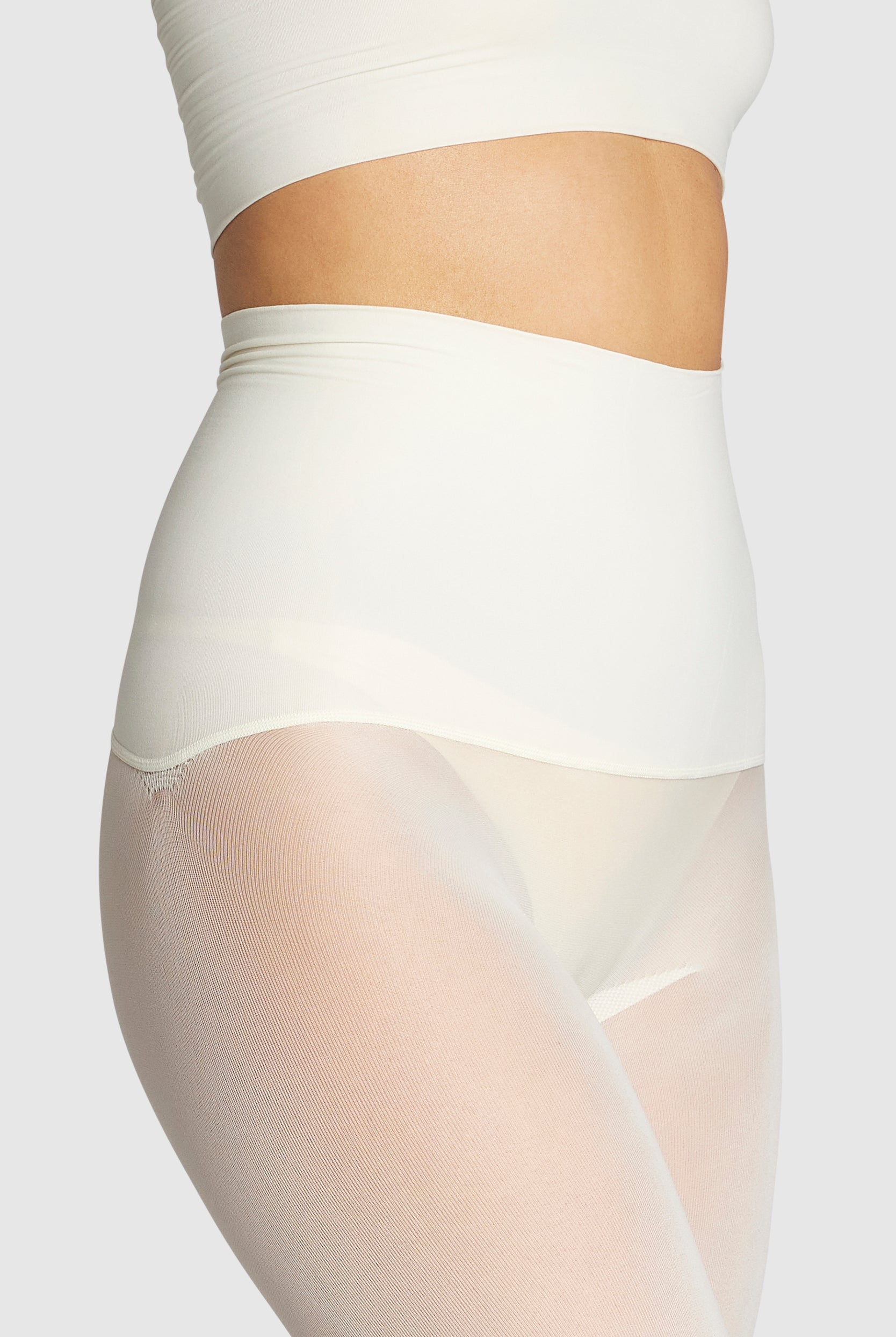Opaque, eco-friendly 60 denier tights in vintage ivory white.