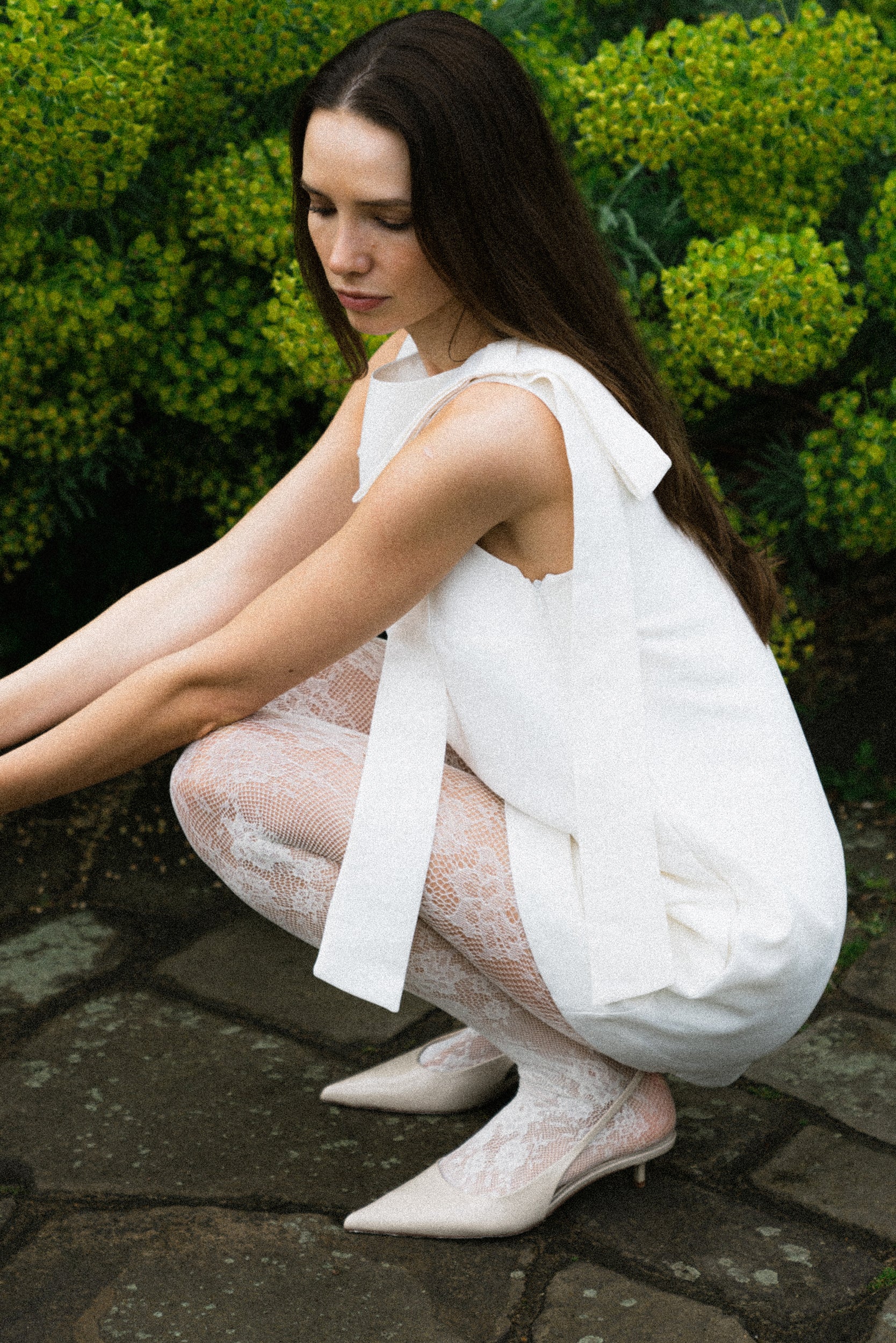 Floral lace tights with adaptive waistband and reinforced toe.