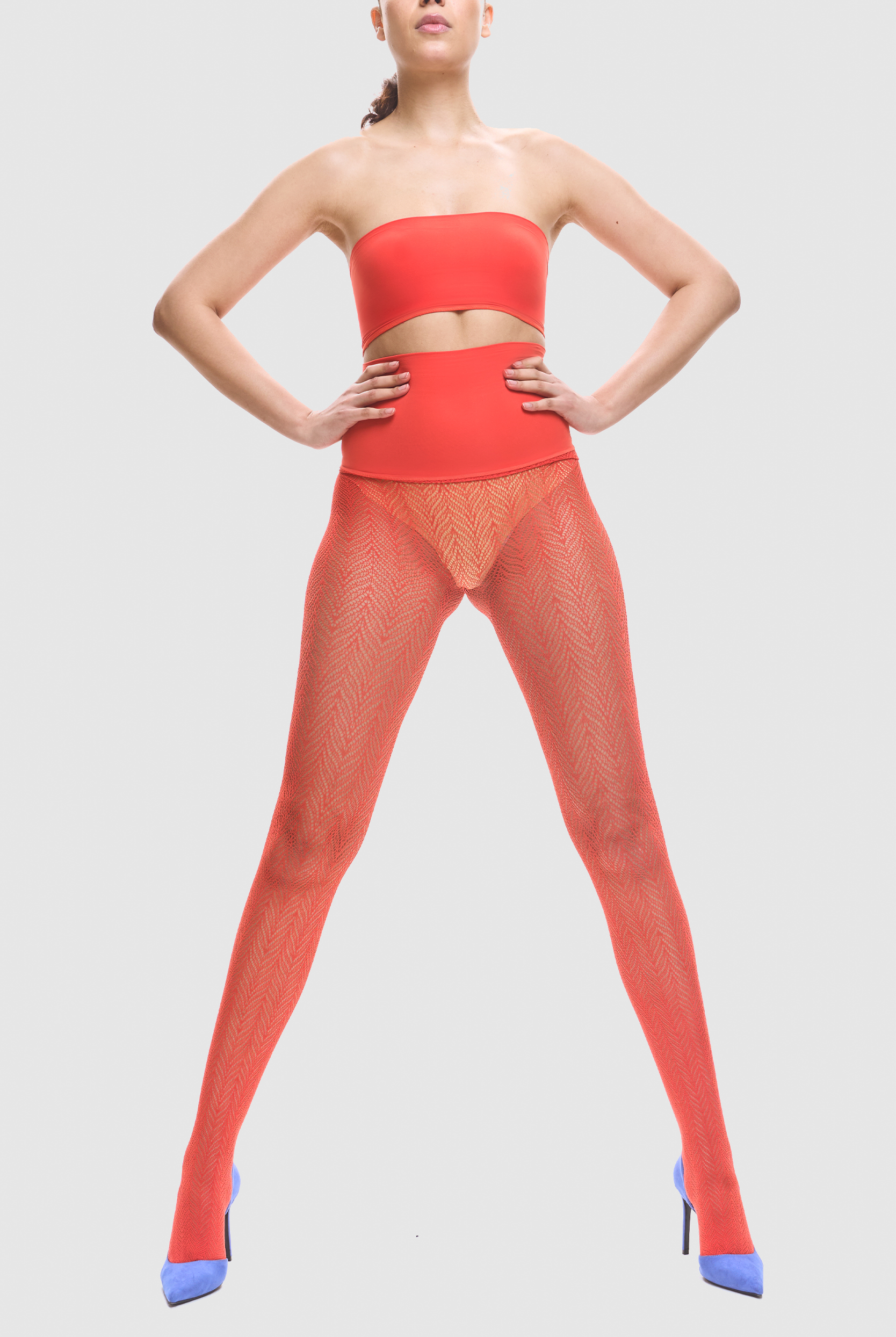 Flame red herringbone fishnet tights.