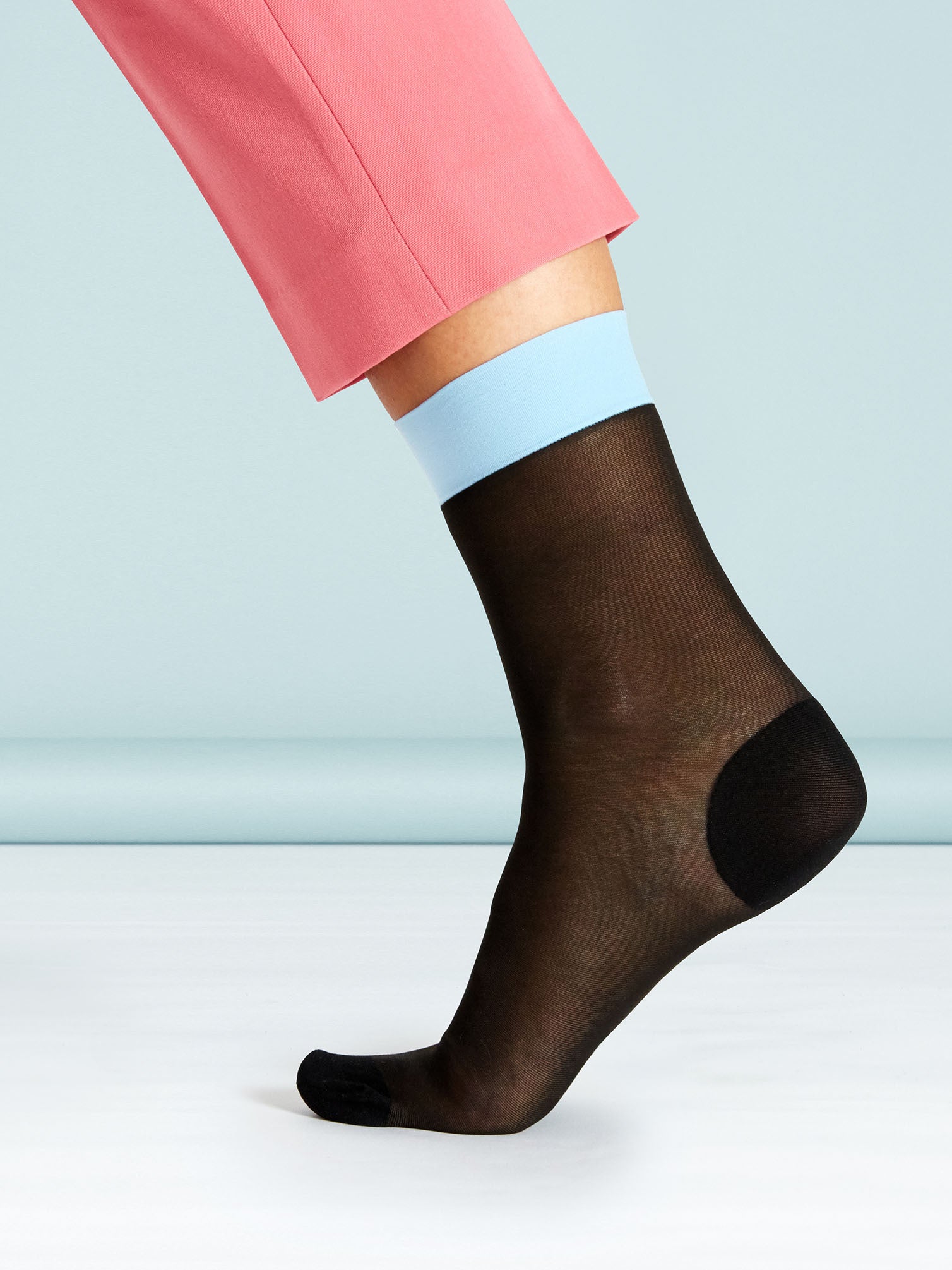 Simple stylish sock transformation with hold-up ankle band.