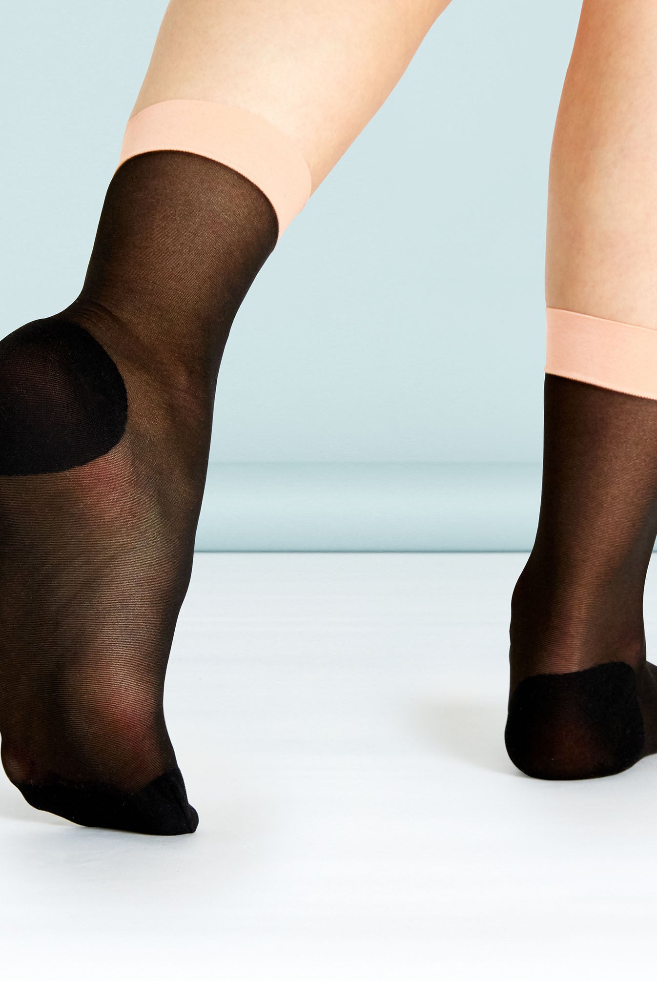 Simple stylish sock transformation with hold-up ankle band.