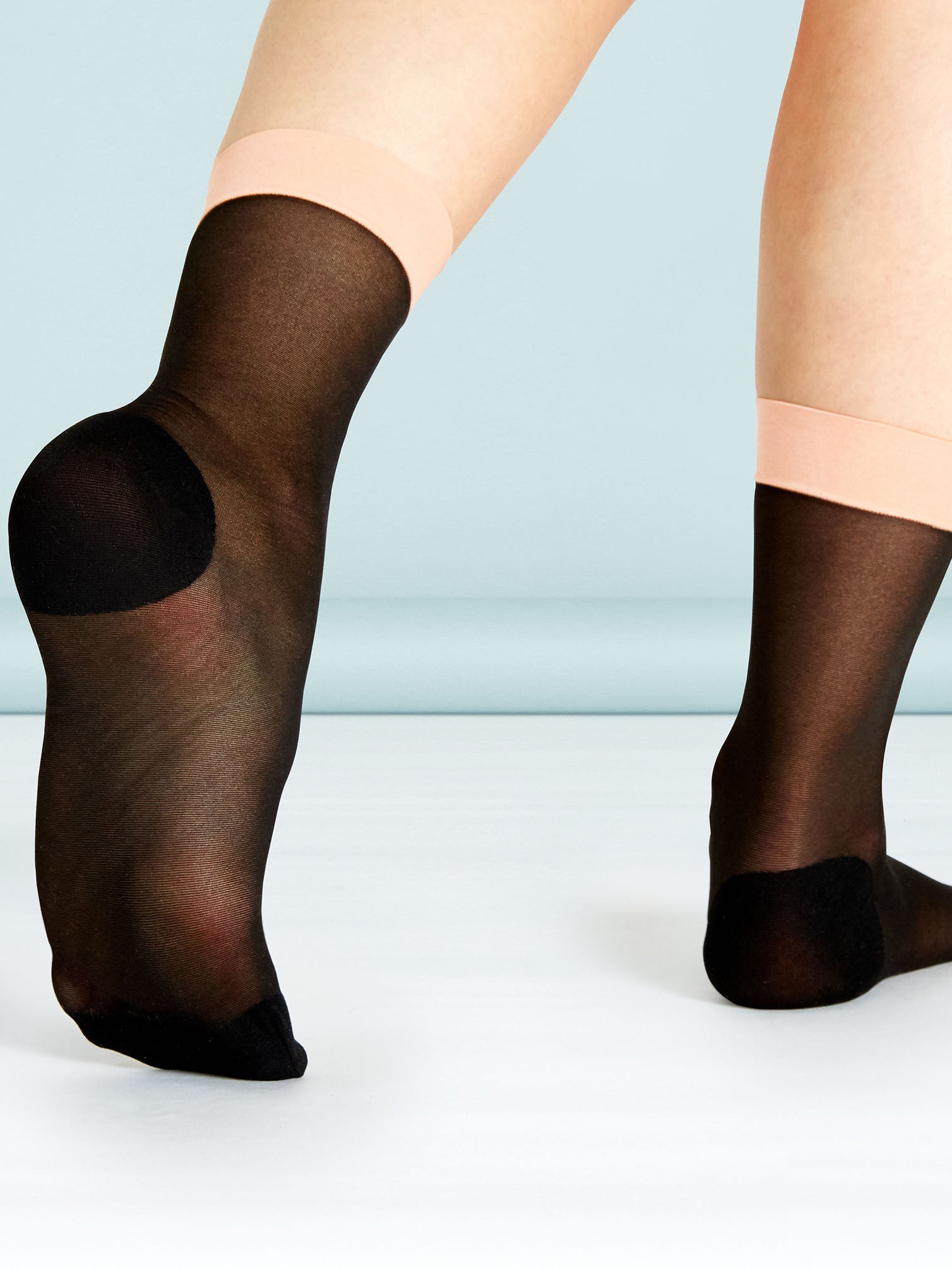Simple stylish sock transformation with hold-up ankle band.