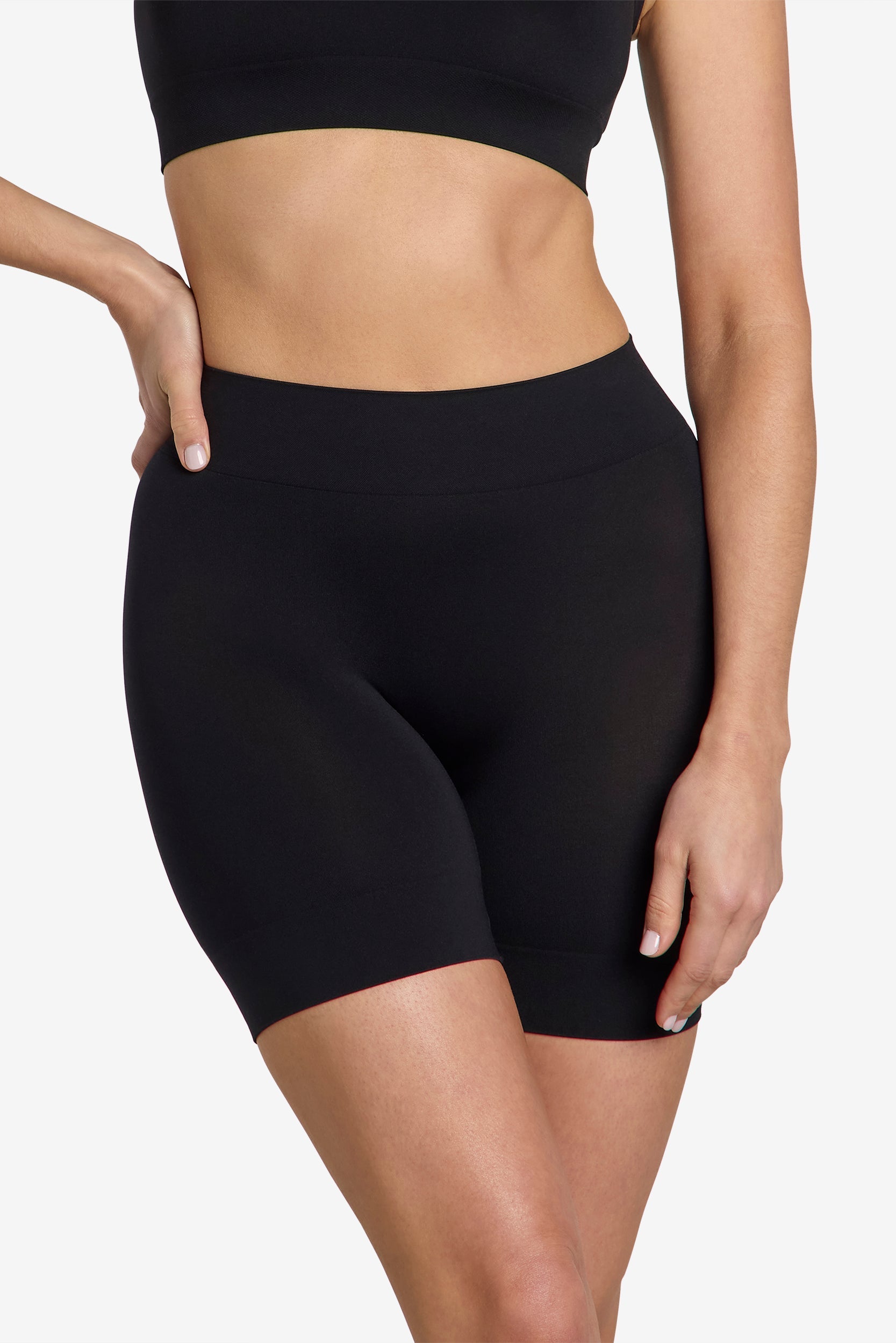 The Softskin Shorty anti-chafing shorts in black, a seamless summer base layer by Heist Studios