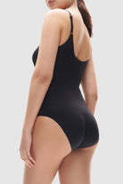 Black shaping bodysuit, smooths, sculpts, supports, perforated.