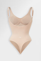 Contour Seamless Thong Body in Almond with support and adjustable straps