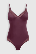 Silky sleek bodysuit with mesh paneling
