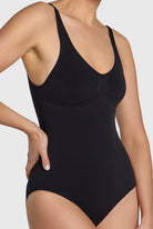 Black seamless body, strong compression and bust support.