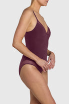 Silky sleek bodysuit with mesh paneling