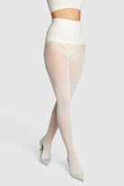 Opaque, eco-friendly 60 denier tights in vintage ivory white.