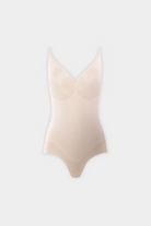 Beige shaping bodysuit, smooths, sculpts, and supports.