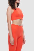 Sleeveless ribbed crop top made from recycled materials.