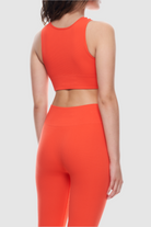 Sleeveless ribbed crop top made from recycled materials.
