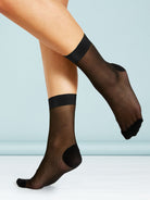 Simple stylish sock transformation with hold-up ankle band.